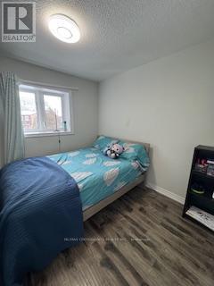 7 Sandhurst Circle E, Toronto, ON - Indoor Photo Showing Bedroom