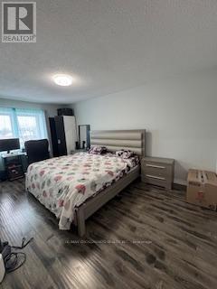 7 Sandhurst Circle E, Toronto, ON - Indoor Photo Showing Bedroom