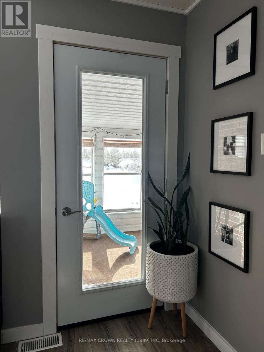 door to attached sunroom - 448 Government Road E, Kapuskasing, ON - Indoor Photo Showing Other Room