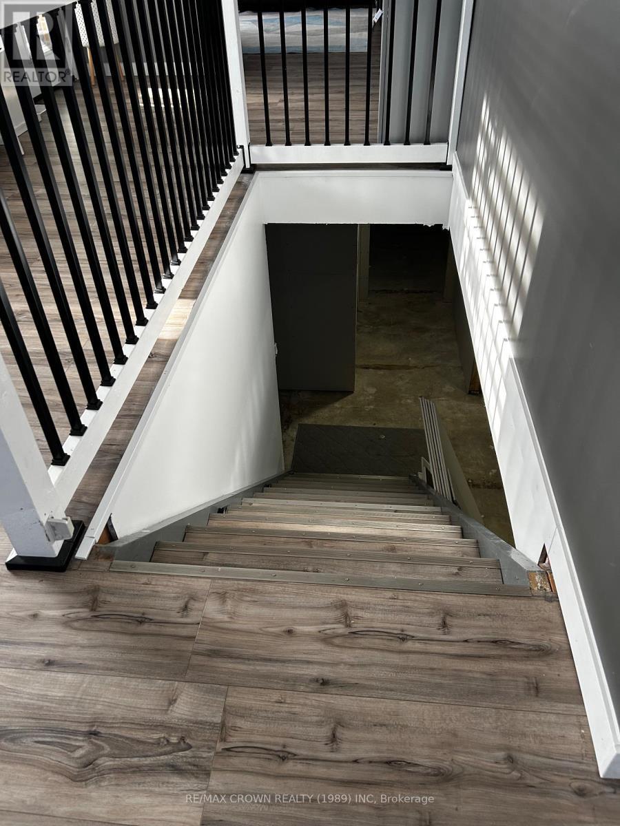 stairs leading to lower level - 448 Government Road E, Kapuskasing, ON - Indoor Photo Showing Other Room