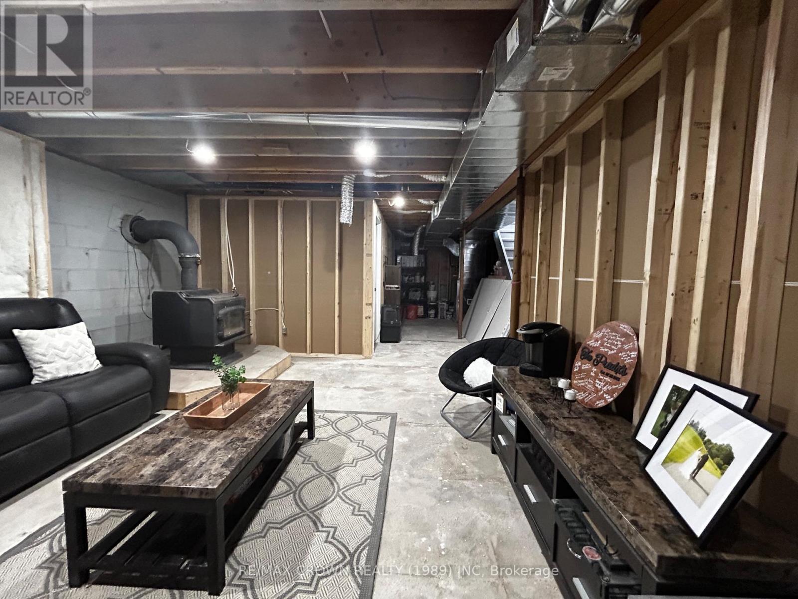 family room area - 448 Government Road E, Kapuskasing, ON - Indoor Photo Showing Basement