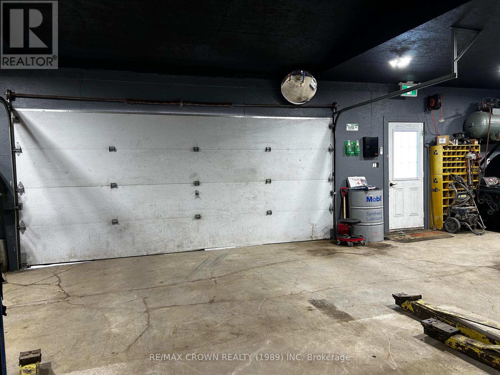 garage interior - 448 Government Road E, Kapuskasing, ON - Indoor Photo Showing Garage