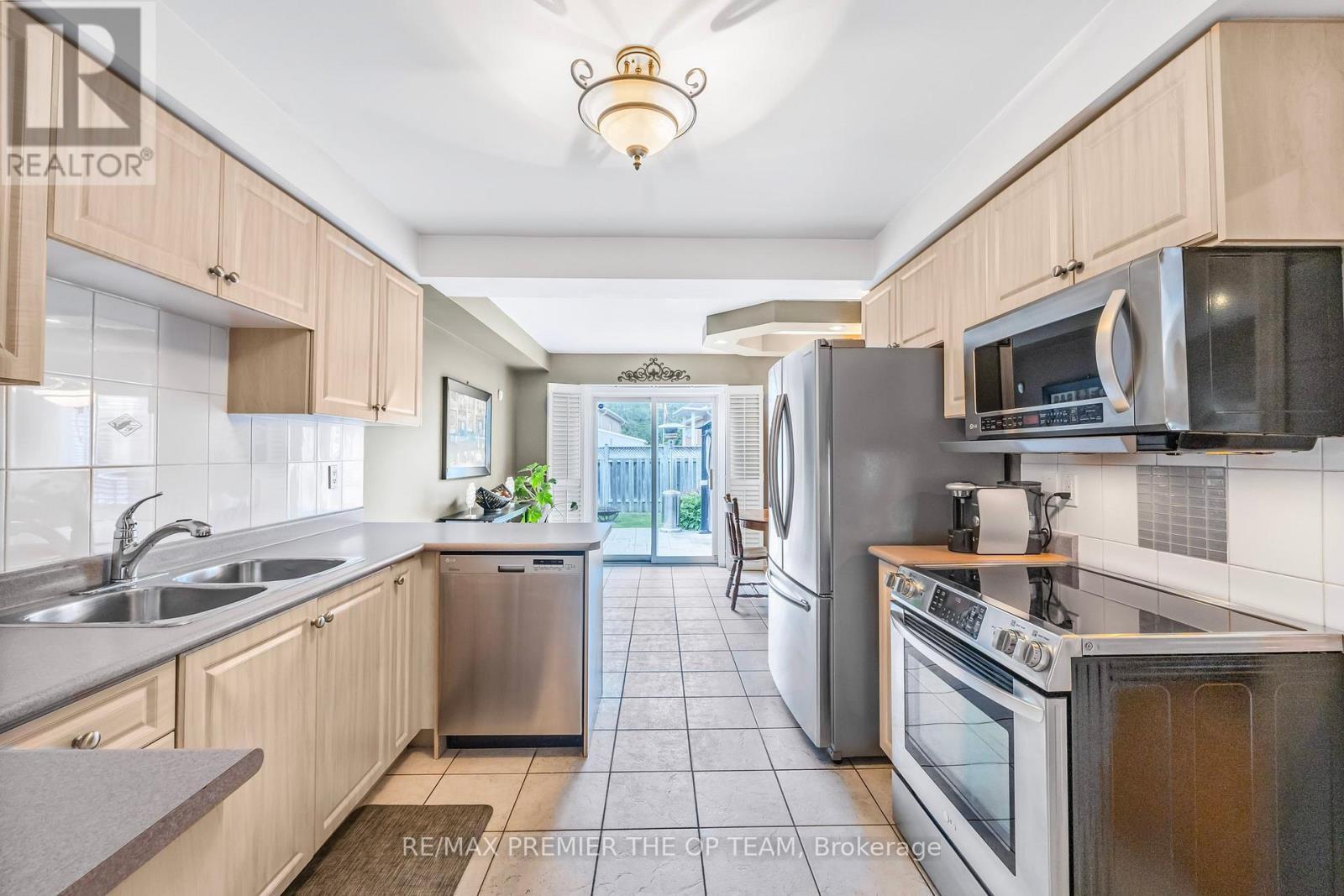 223 Landsbridge Street, Caledon, ON - Indoor Photo Showing Kitchen With Stainless Steel Kitchen With Double Sink