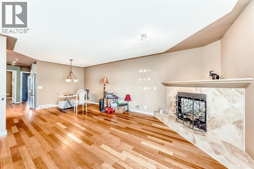 274 Templeview Way Ne, Calgary, AB - Indoor With Fireplace