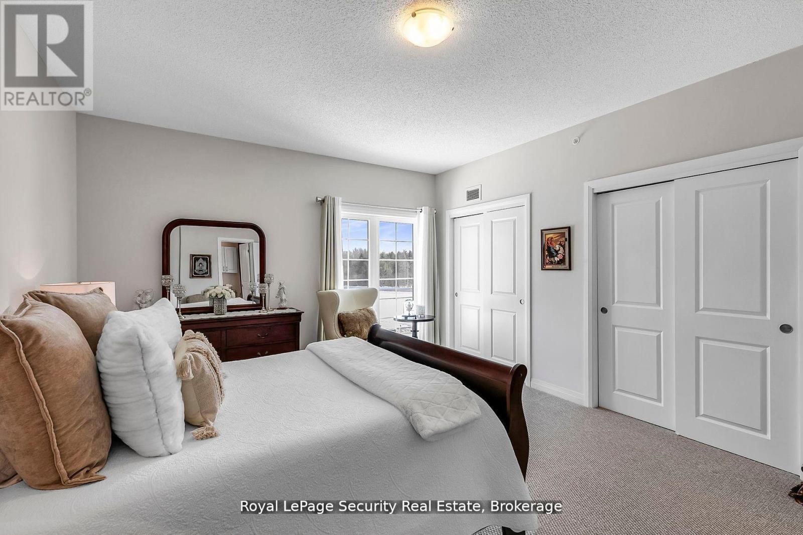 217 - 54 Koda Street, Barrie, ON - Indoor Photo Showing Bedroom