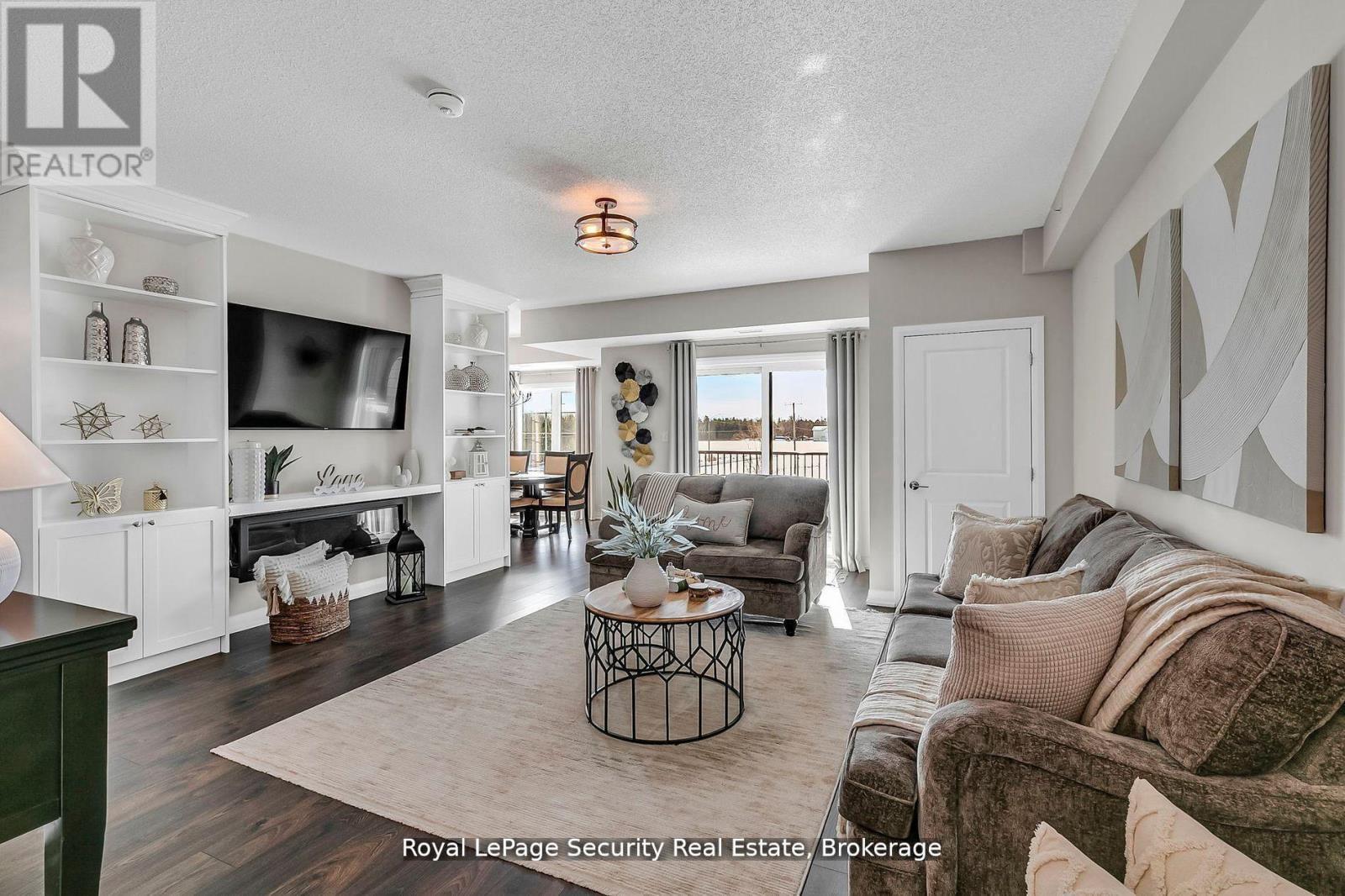217 - 54 Koda Street, Barrie, ON - Indoor Photo Showing Living Room