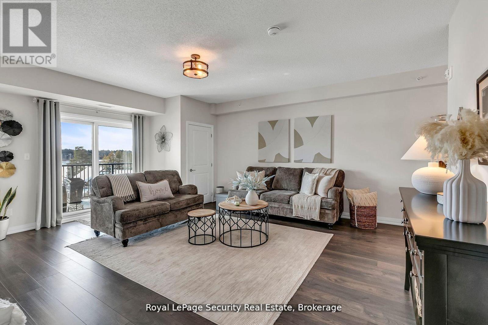 217 - 54 Koda Street, Barrie, ON - Indoor Photo Showing Living Room