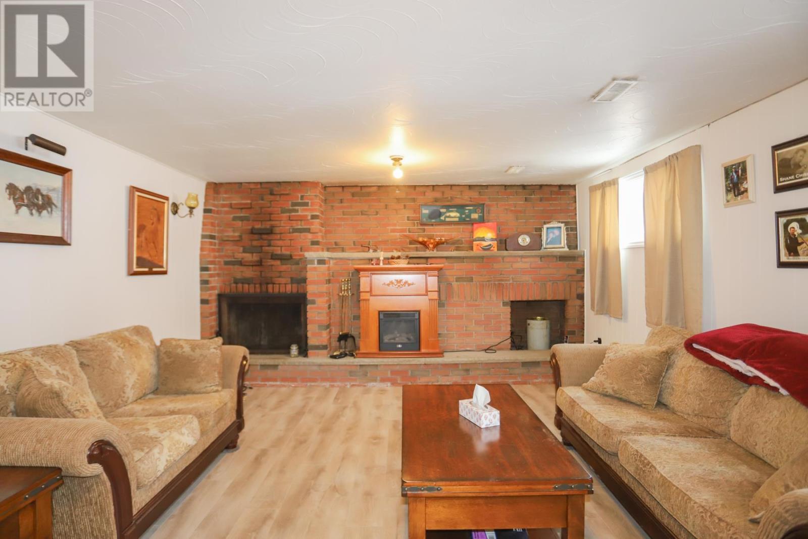 224 Doncaster Rd, Sault Ste. Marie, ON - Indoor Photo Showing Living Room With Fireplace