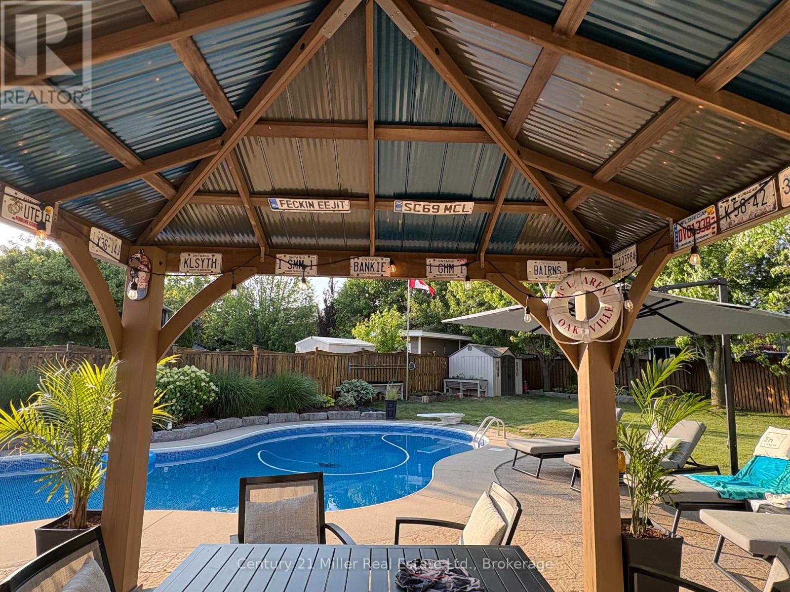 2099 Helmsley Avenue, Oakville (Wm Westmount), ON - Outdoor With In Ground Pool With Deck Patio Veranda