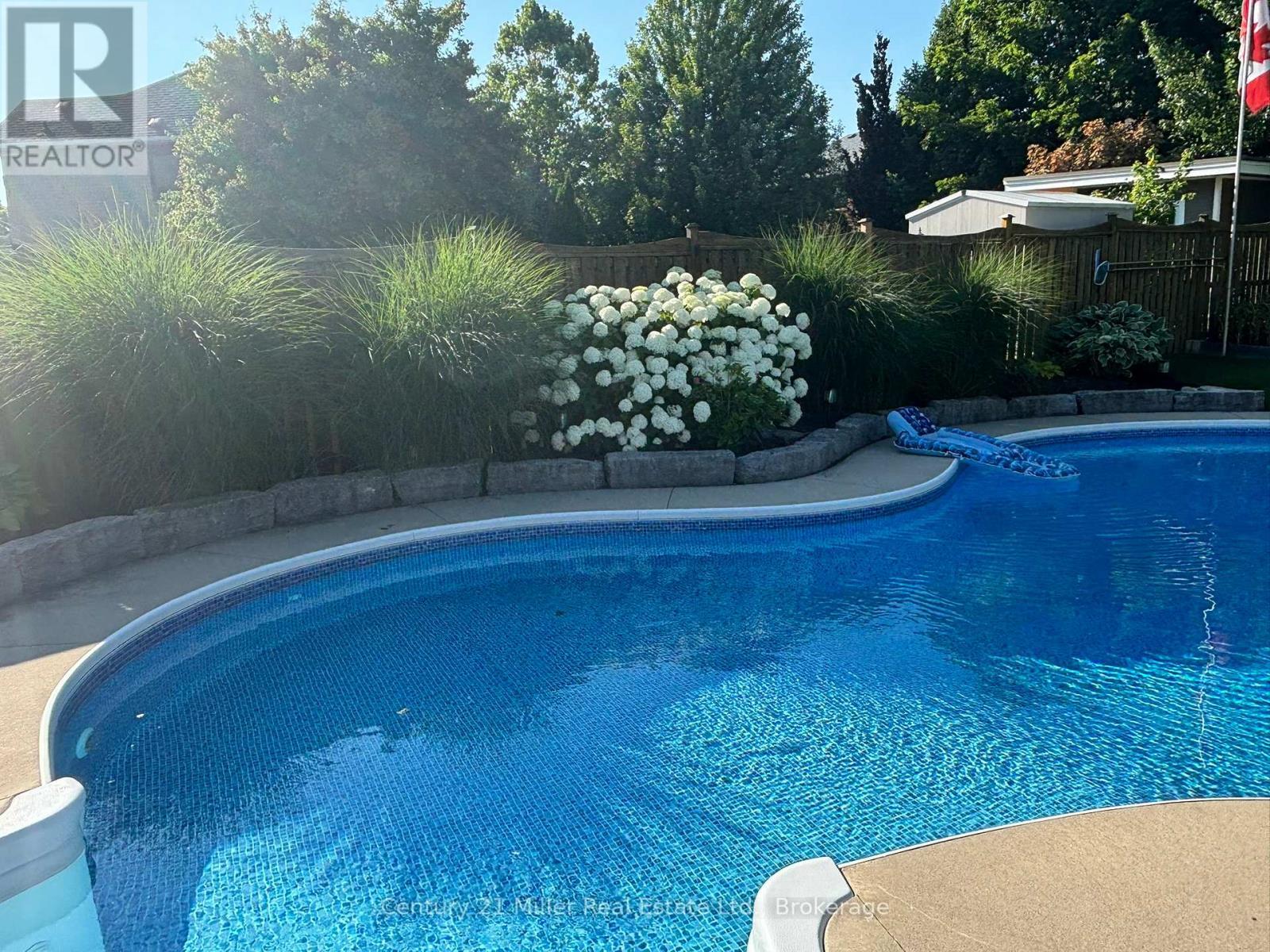2099 Helmsley Avenue, Oakville (Wm Westmount), ON - Outdoor With In Ground Pool With Backyard
