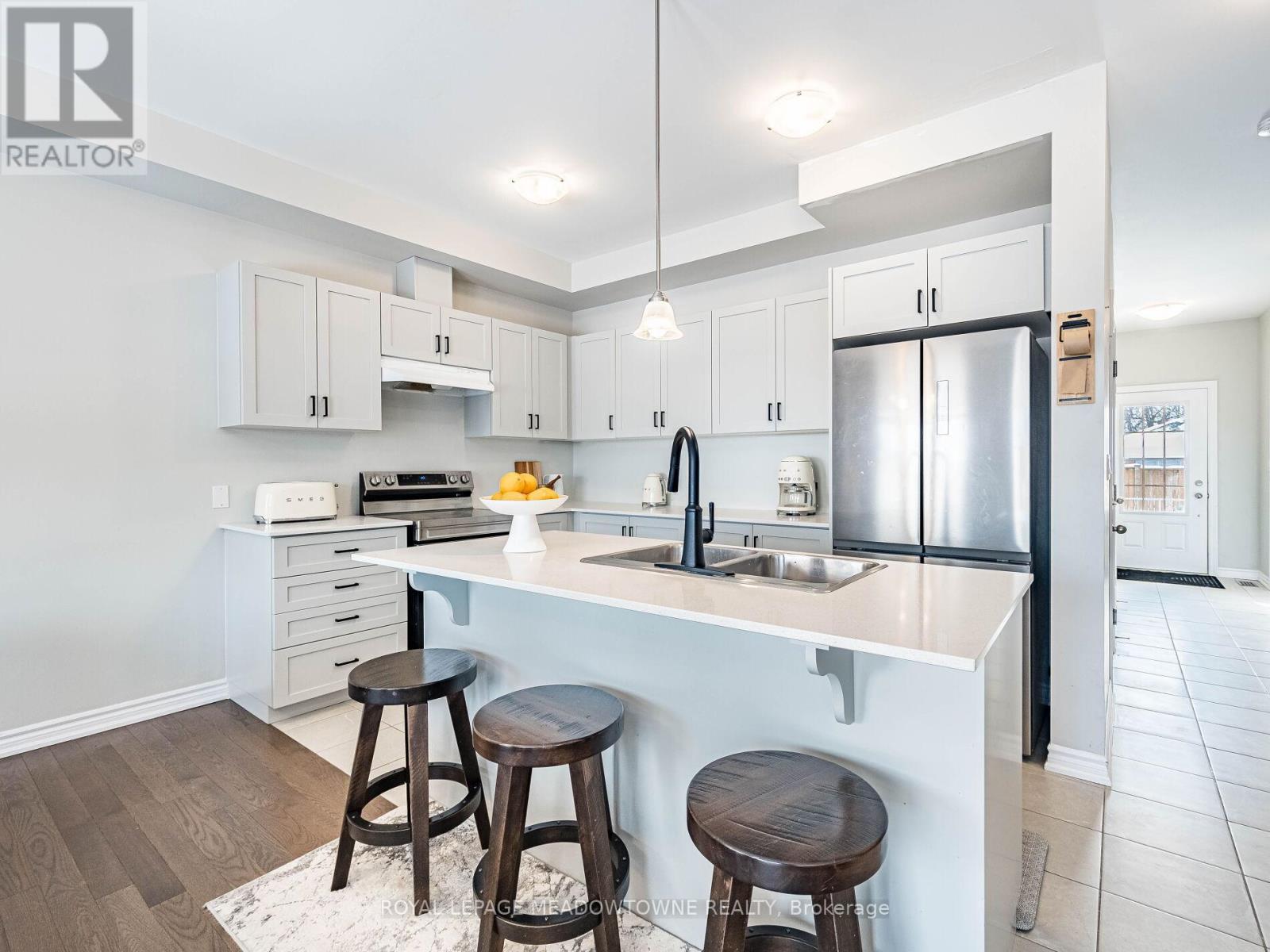 Stunning kitchen with large centre island - 7 - 13 Braida Lane, Halton Hills, ON - Indoor Photo Showing Kitchen With Double Sink