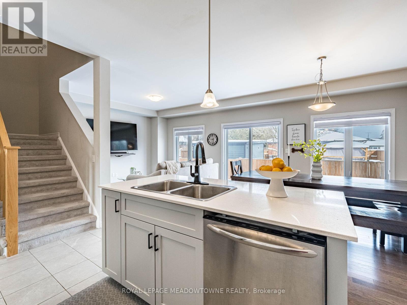 Abundance of light through large windows - 7 - 13 Braida Lane, Halton Hills, ON - Indoor Photo Showing Kitchen With Double Sink