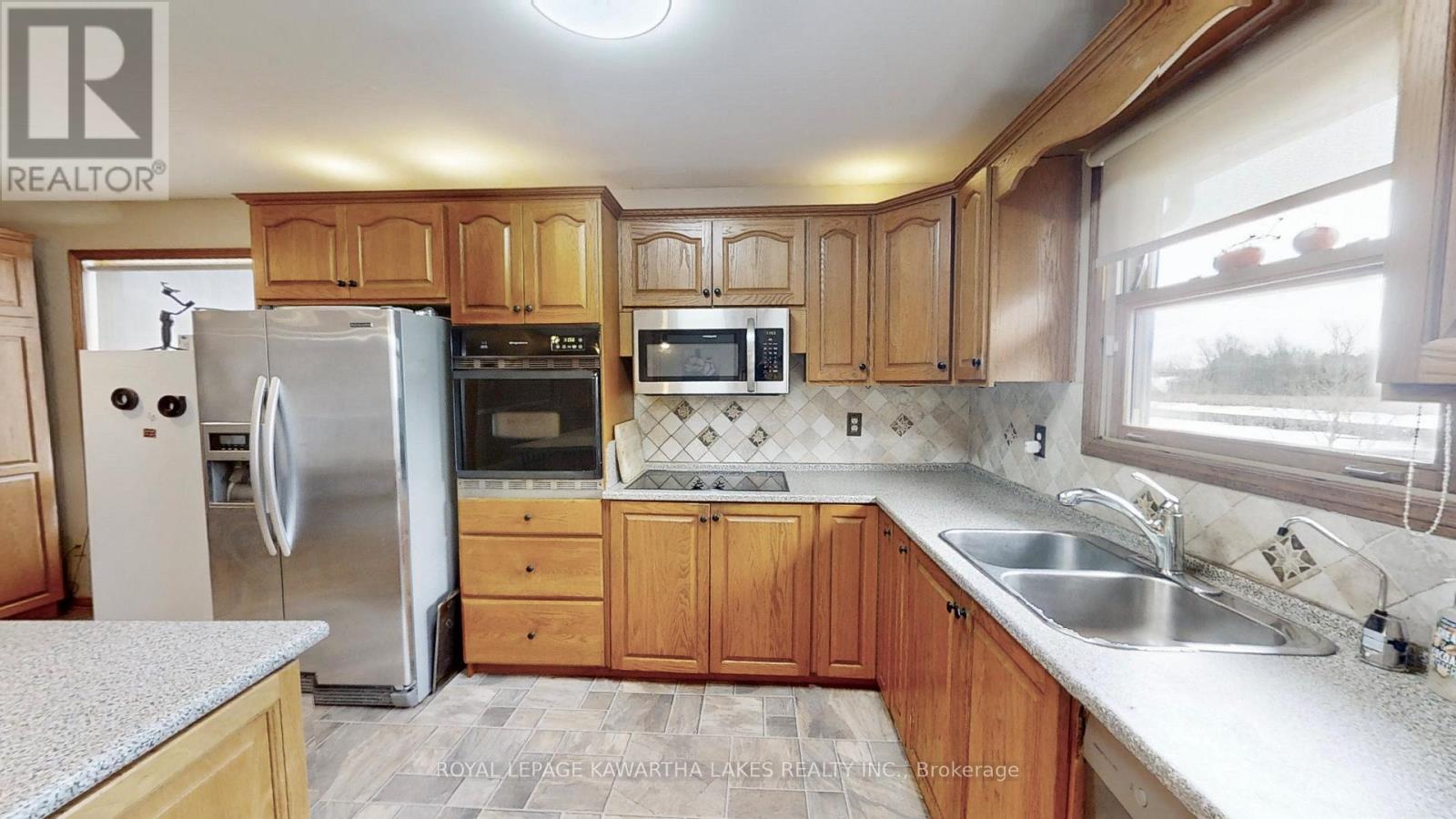21 Trent View Road, Kawartha Lakes (Eldon), ON - Indoor Photo Showing Kitchen With Double Sink