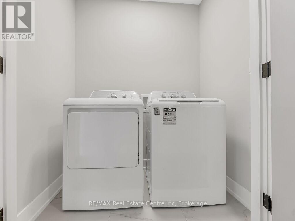 9 - 297 Whiting Street, Ingersoll (Ingersoll - South), ON - Indoor Photo Showing Laundry Room