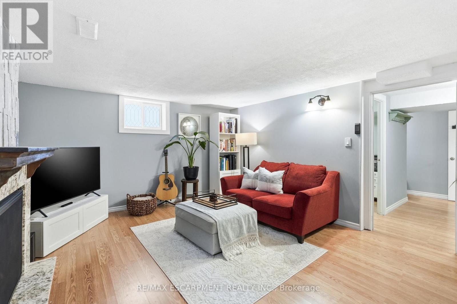8 Elmore Drive N, Hamilton, ON - Indoor Photo Showing Other Room With Fireplace
