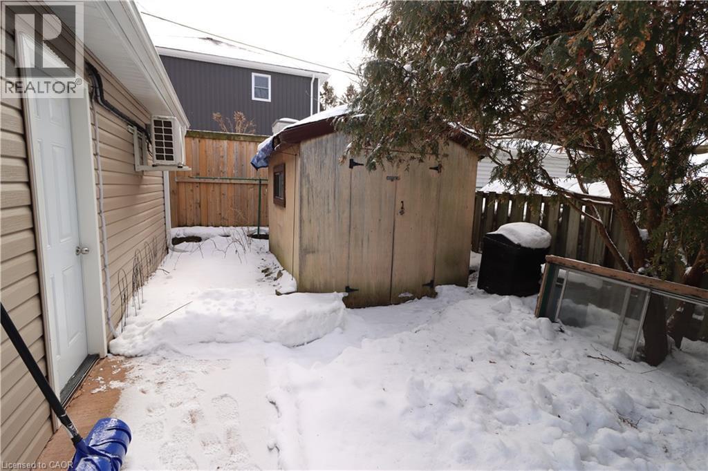 Note: separate storage shed roof requires repair. - 344 Paisley Road, Guelph, ON - Outdoor With Exterior