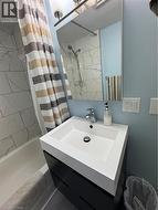 The 2022 bathroom renovation ($9,715.93) adds modern style with subway-tile finishes and a unique peek-a-boo shower window. -