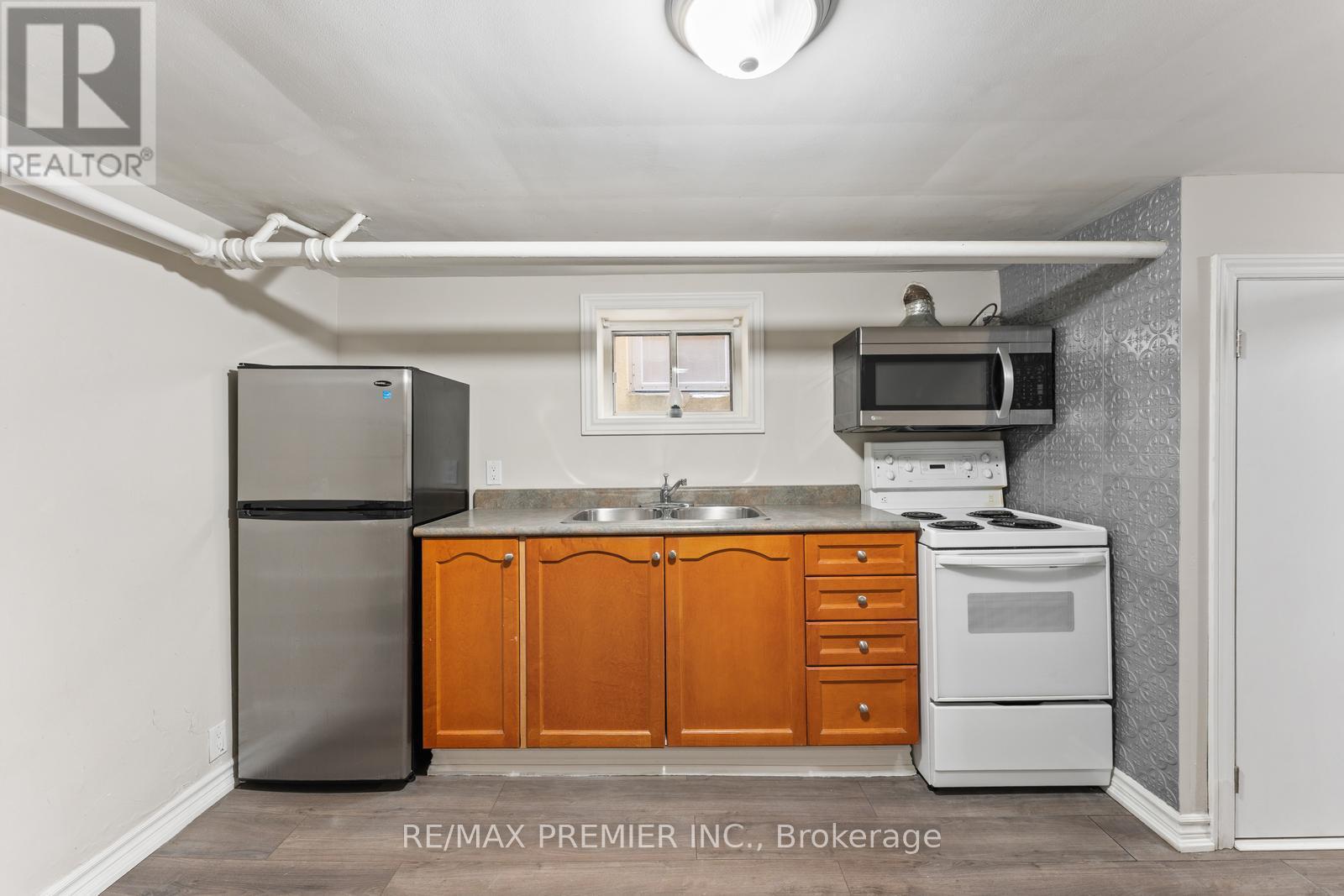 1013 Briar Hill Avenue, Toronto, ON - Indoor Photo Showing Kitchen With Double Sink