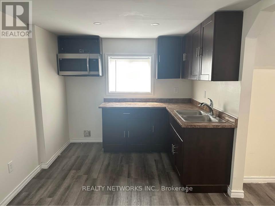 163 Elm Street N, Timmins (Tne - Central), ON - Indoor Photo Showing Kitchen With Double Sink