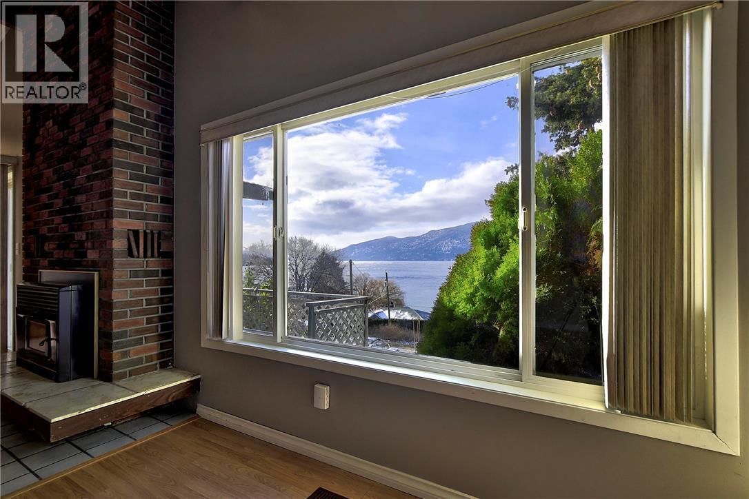 12911 Pixton Road, Lake Country, BC - Indoor Photo Showing Other Room With Fireplace