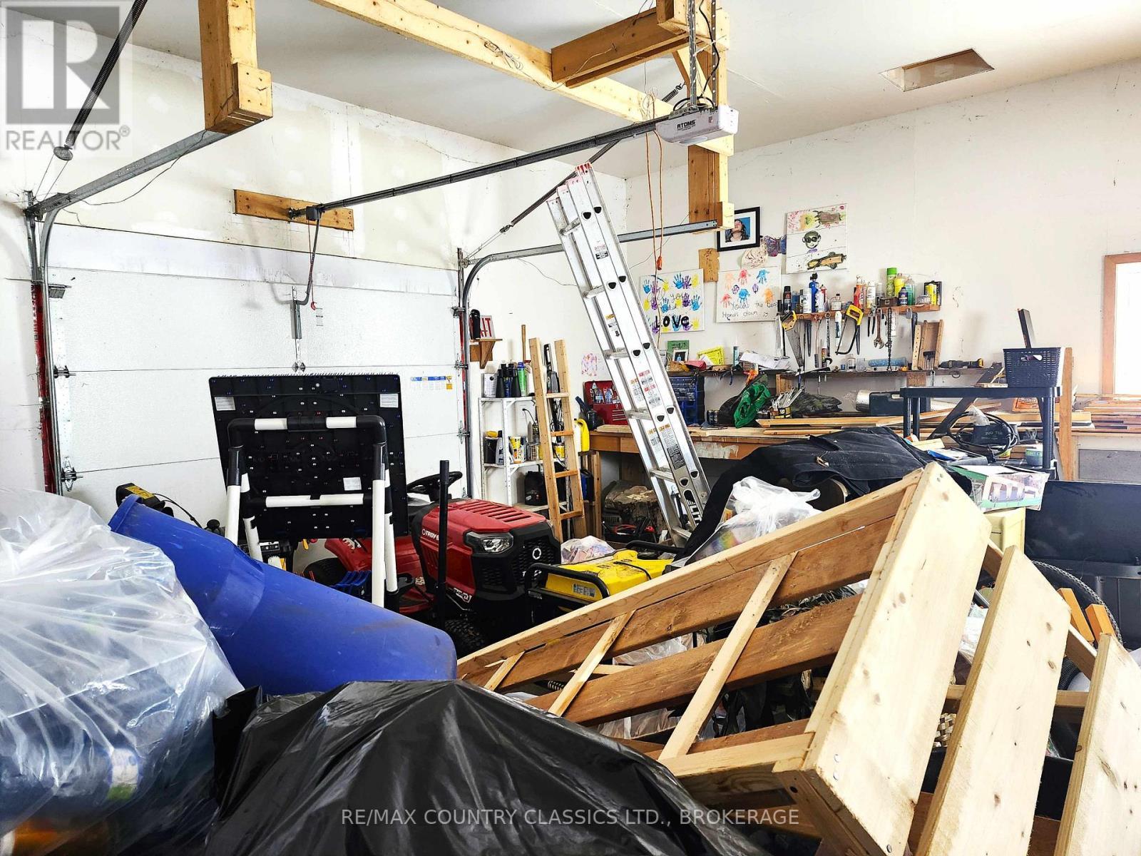 214 Addington Road 2, Addington Highlands (Addington Highlands), ON - Indoor Photo Showing Garage