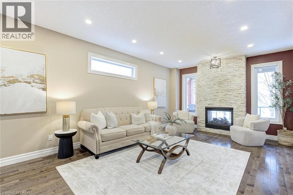 941 Pioneer Grove Court, Kitchener, ON - Indoor Photo Showing Living Room With Fireplace