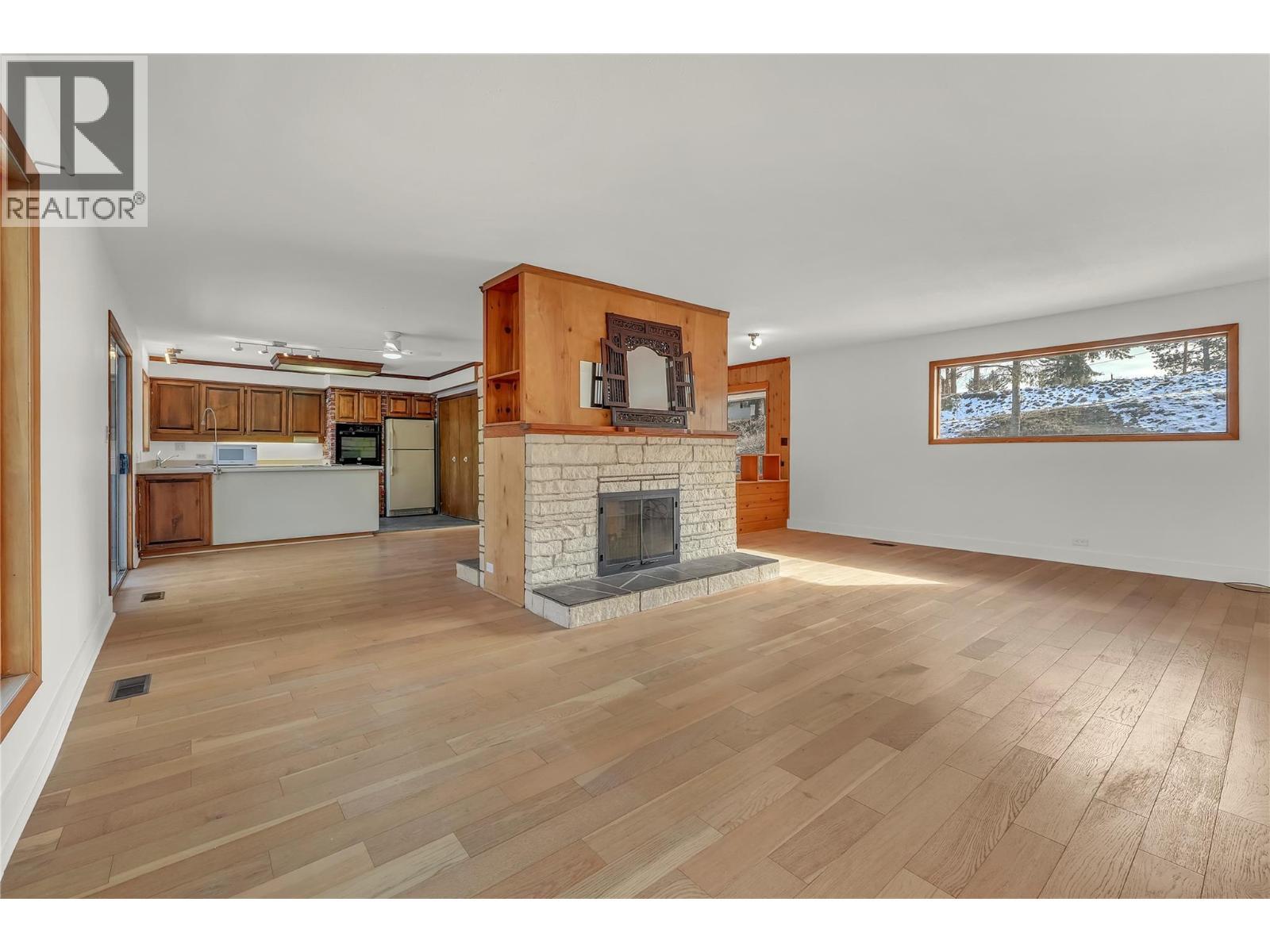 379 Mayne Avenue, Princeton, BC - Indoor Photo Showing Living Room With Fireplace