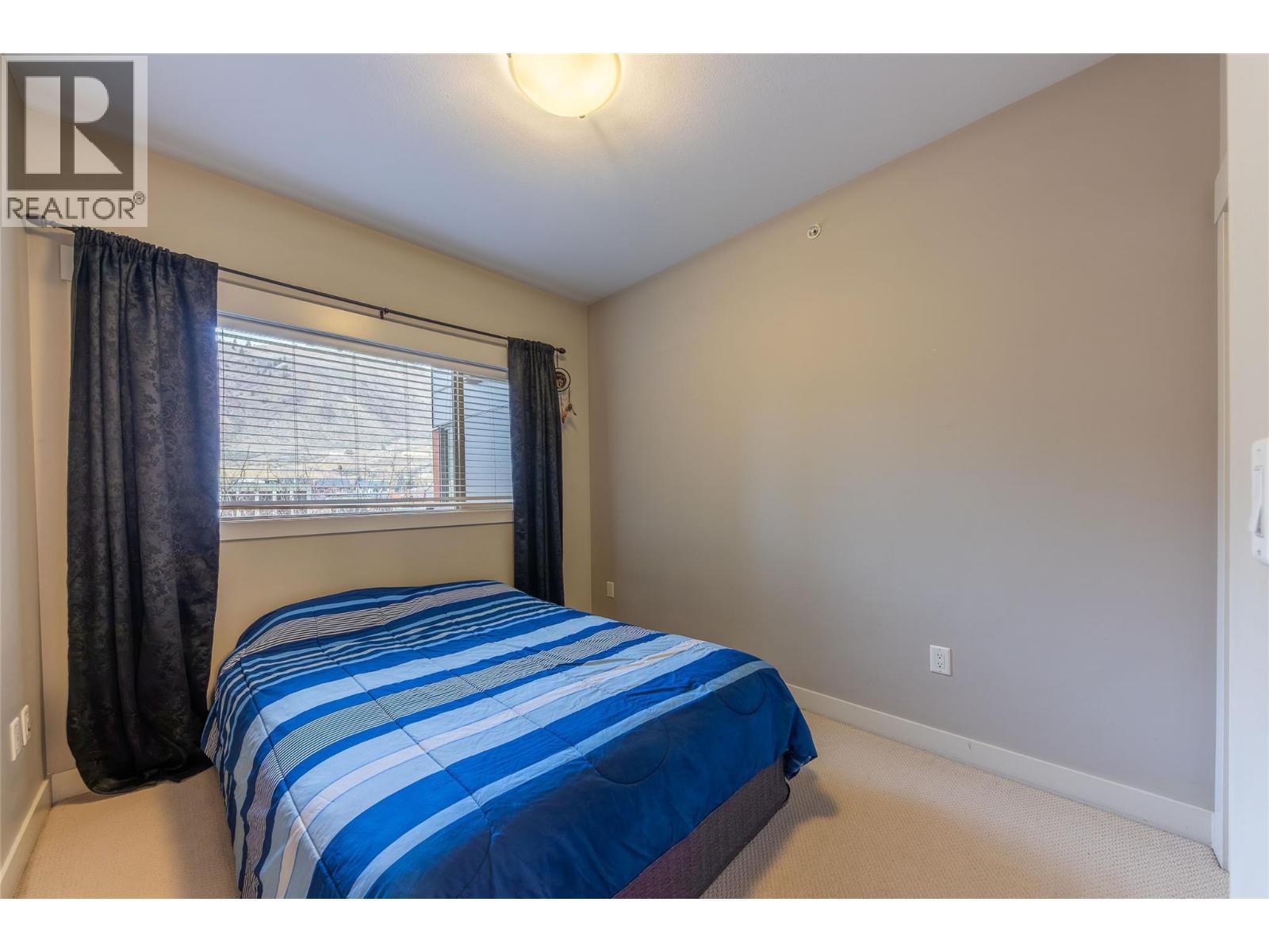 1030 Talasa Way Unit# 2410, Kamloops, BC - Indoor Photo Showing Bedroom
