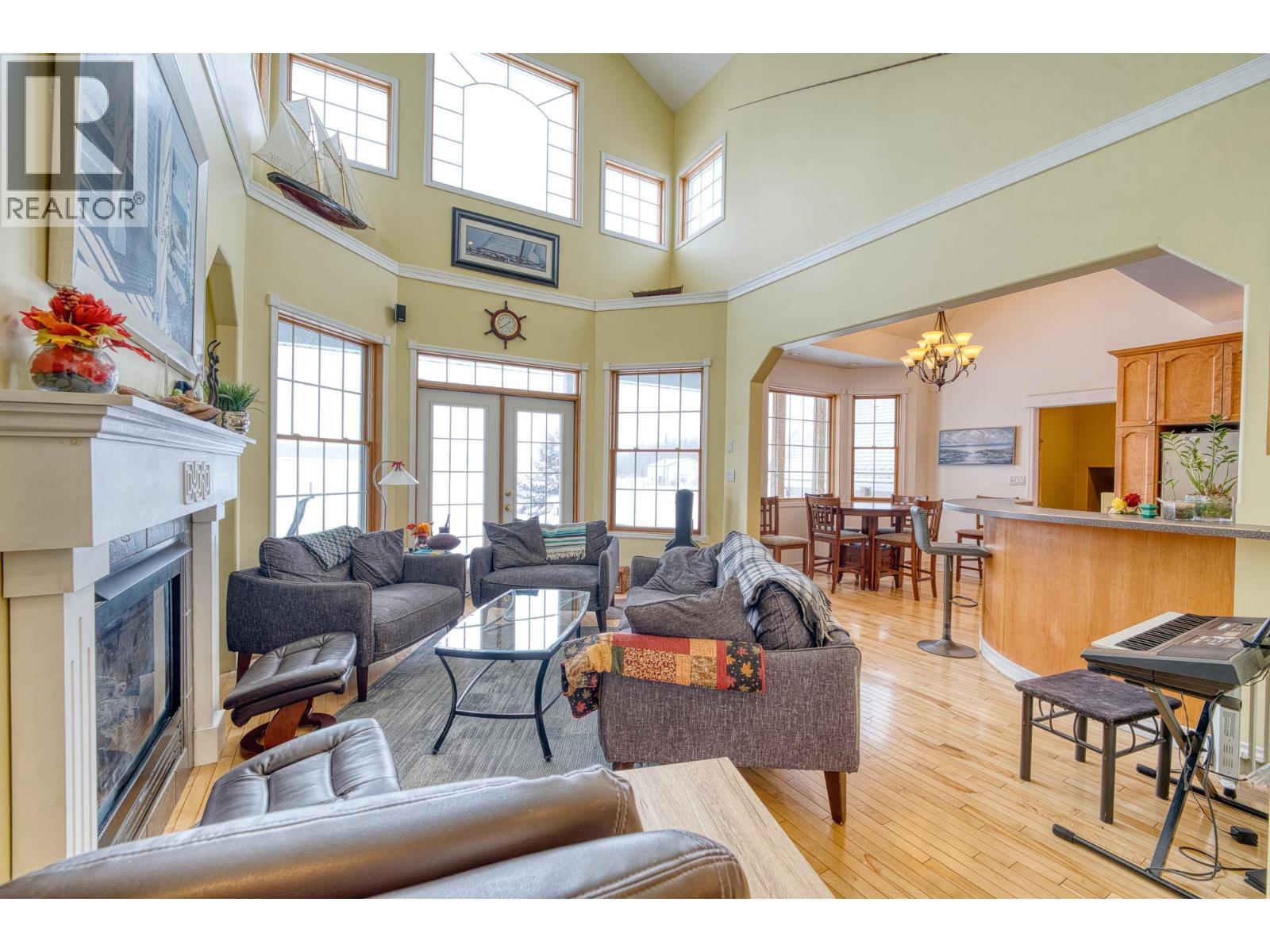 10706 244 Road, Fort St. John, BC - Indoor Photo Showing Living Room With Fireplace