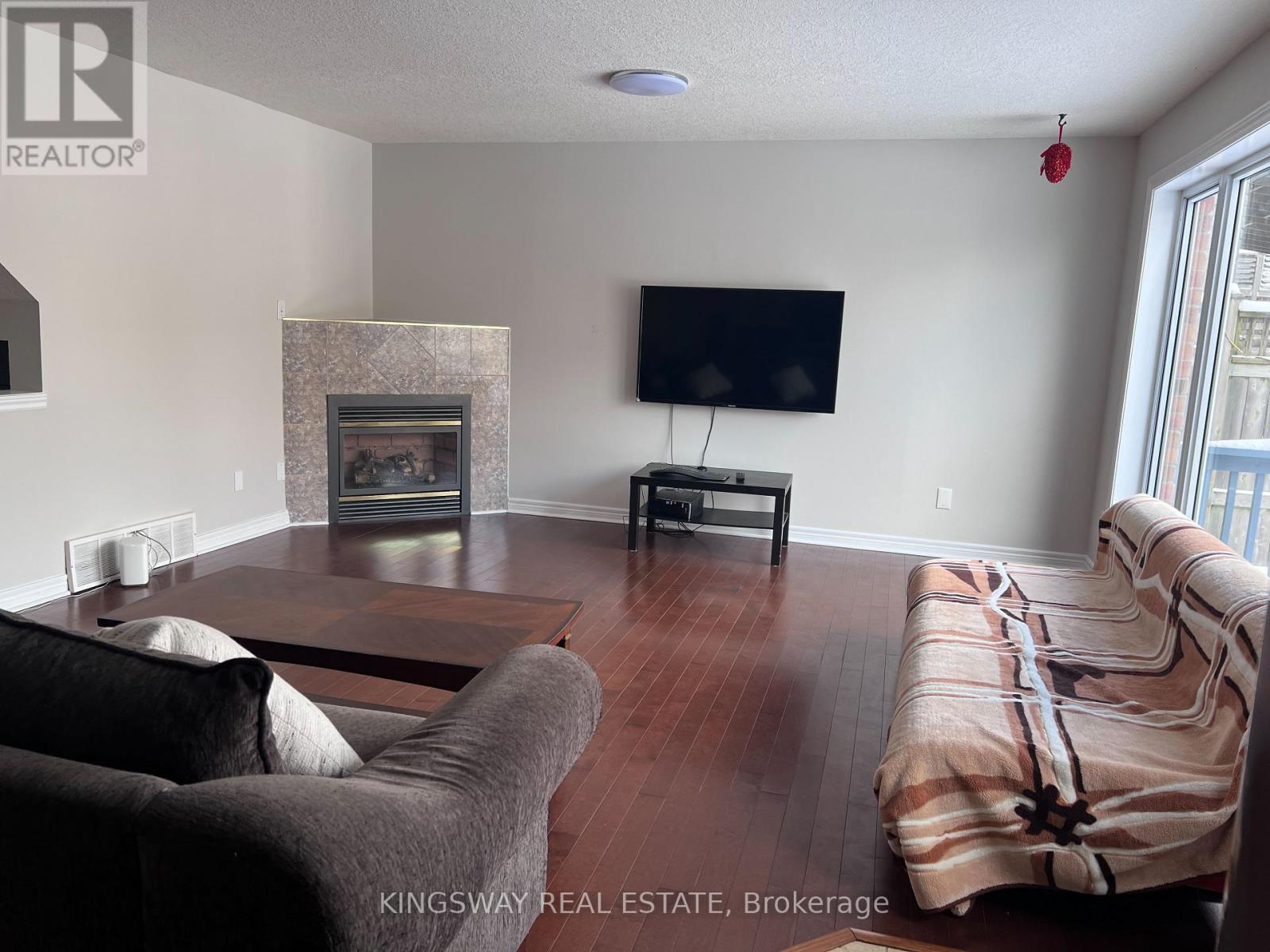 242 Doon Mills Drive, Kitchener, ON - Indoor Photo Showing Living Room With Fireplace