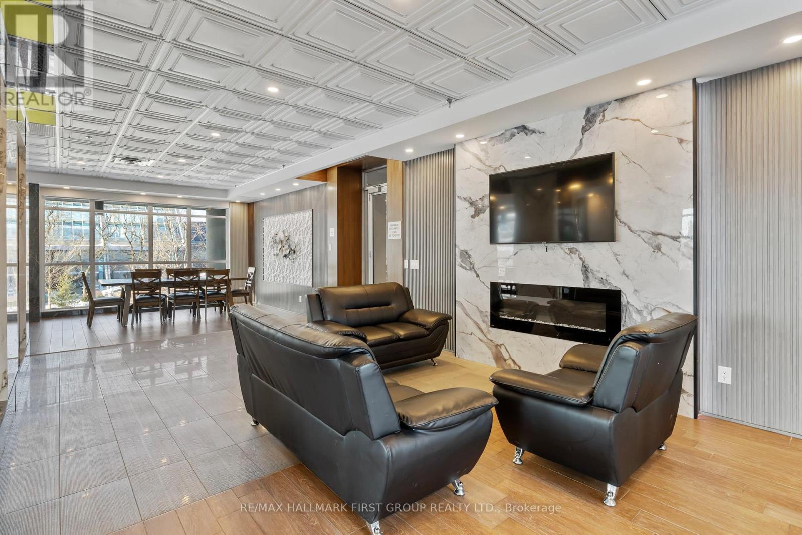 405 - 70 Town Centre Court, Toronto, ON - Indoor With Fireplace