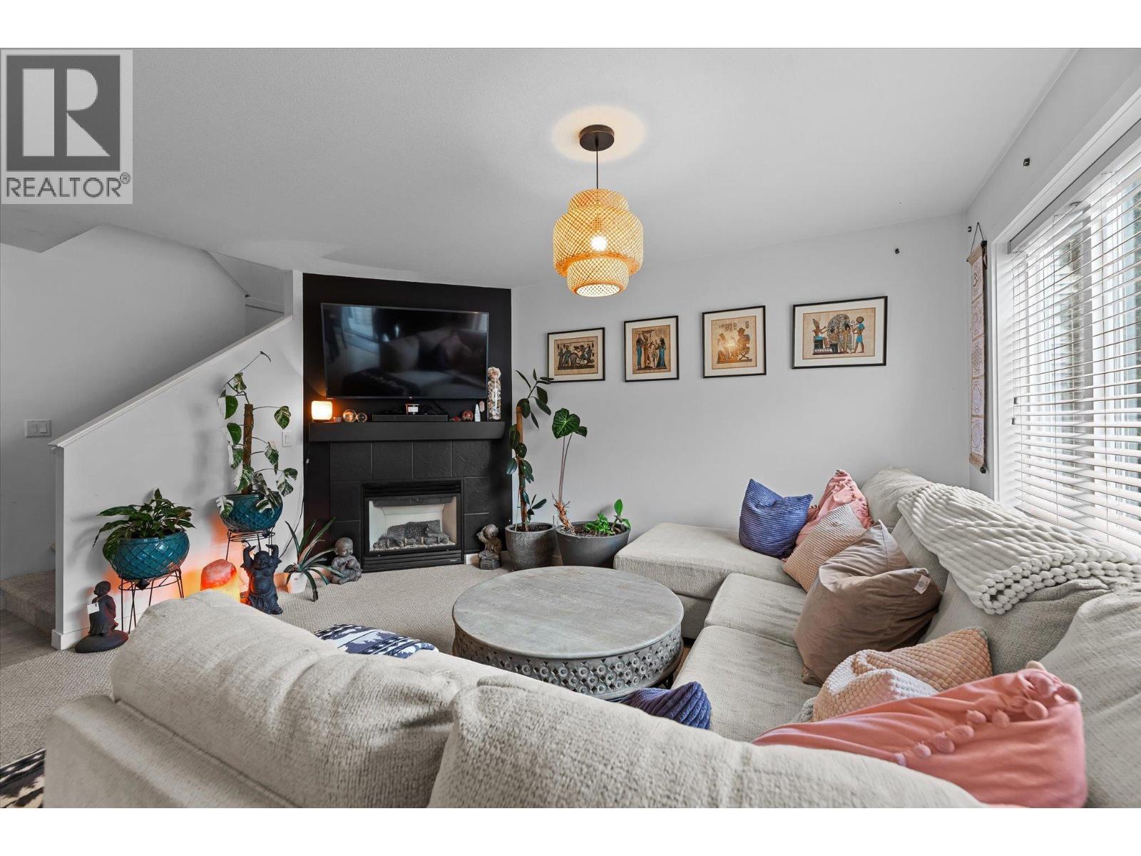 2003 Montego Street, West Kelowna, BC - Indoor Photo Showing Living Room With Fireplace