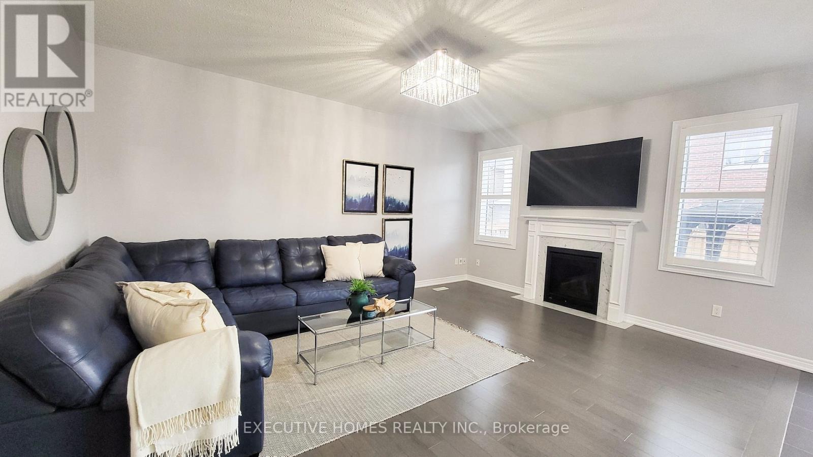 7 Spokanne Street, Brampton, ON - Indoor Photo Showing Living Room With Fireplace