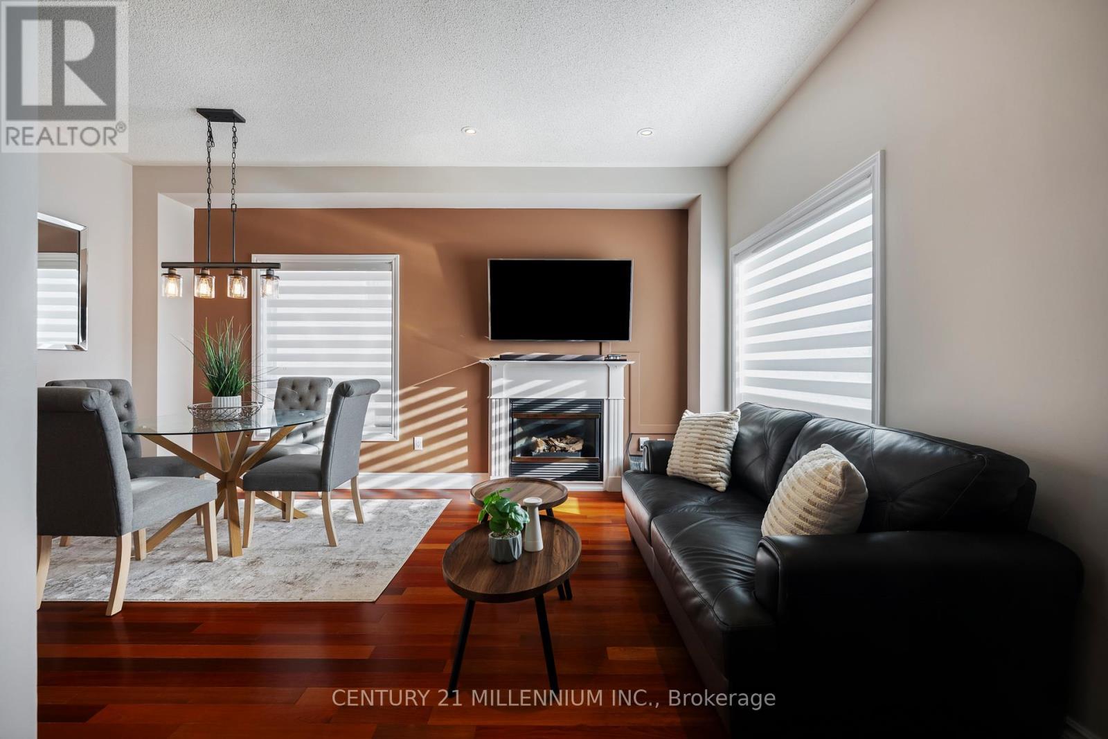 42 Rubysilver Drive, Brampton, ON - Indoor Photo Showing Living Room With Fireplace