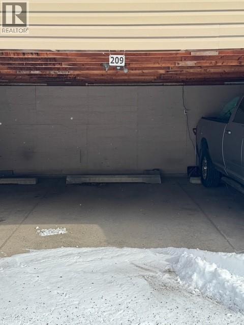 1335 Alpine Drive Unit# 209B, Elkford, BC - Indoor Photo Showing Garage