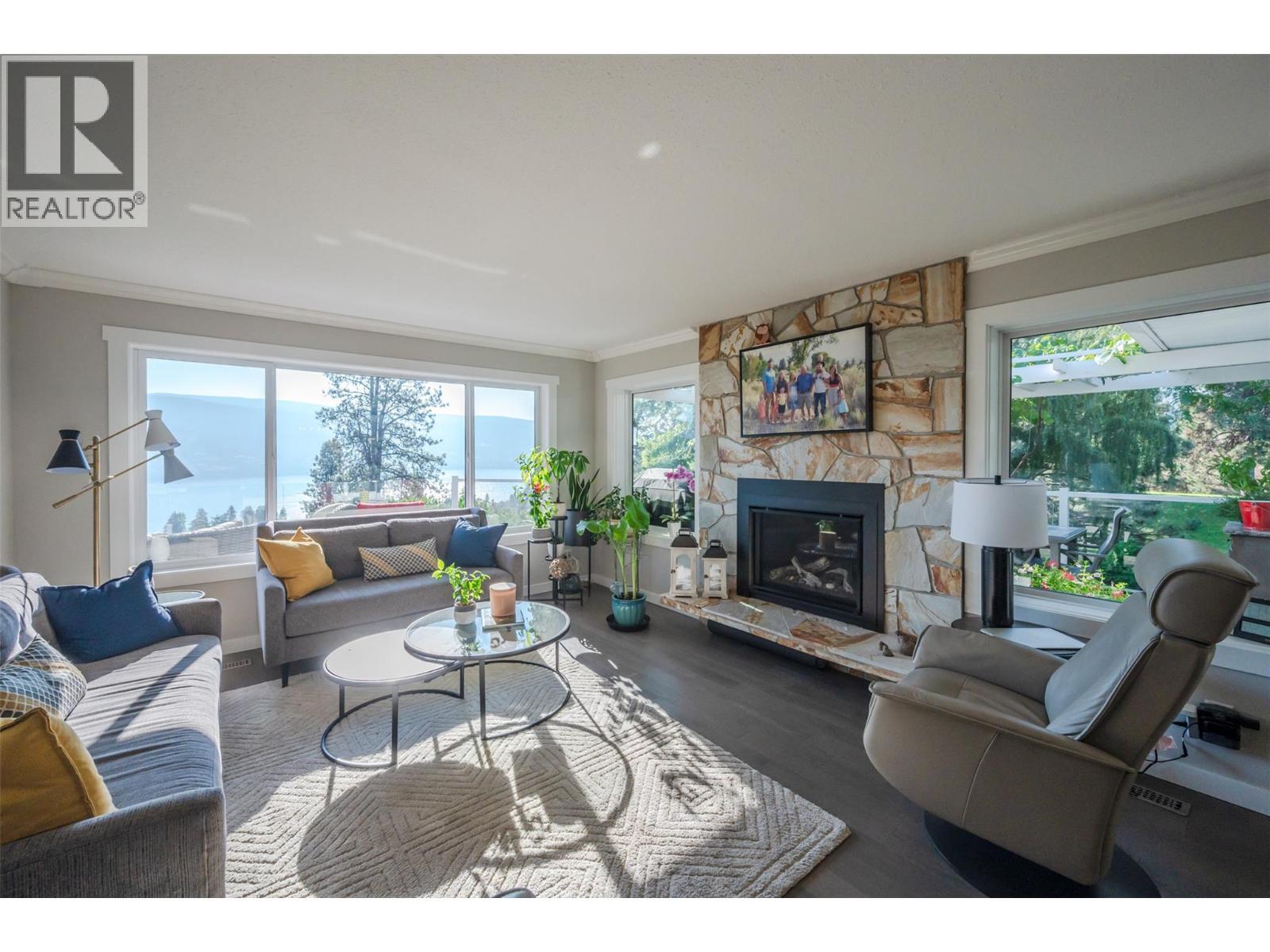 150 Sumac Ridge Drive, Summerland, BC - Indoor Photo Showing Living Room With Fireplace