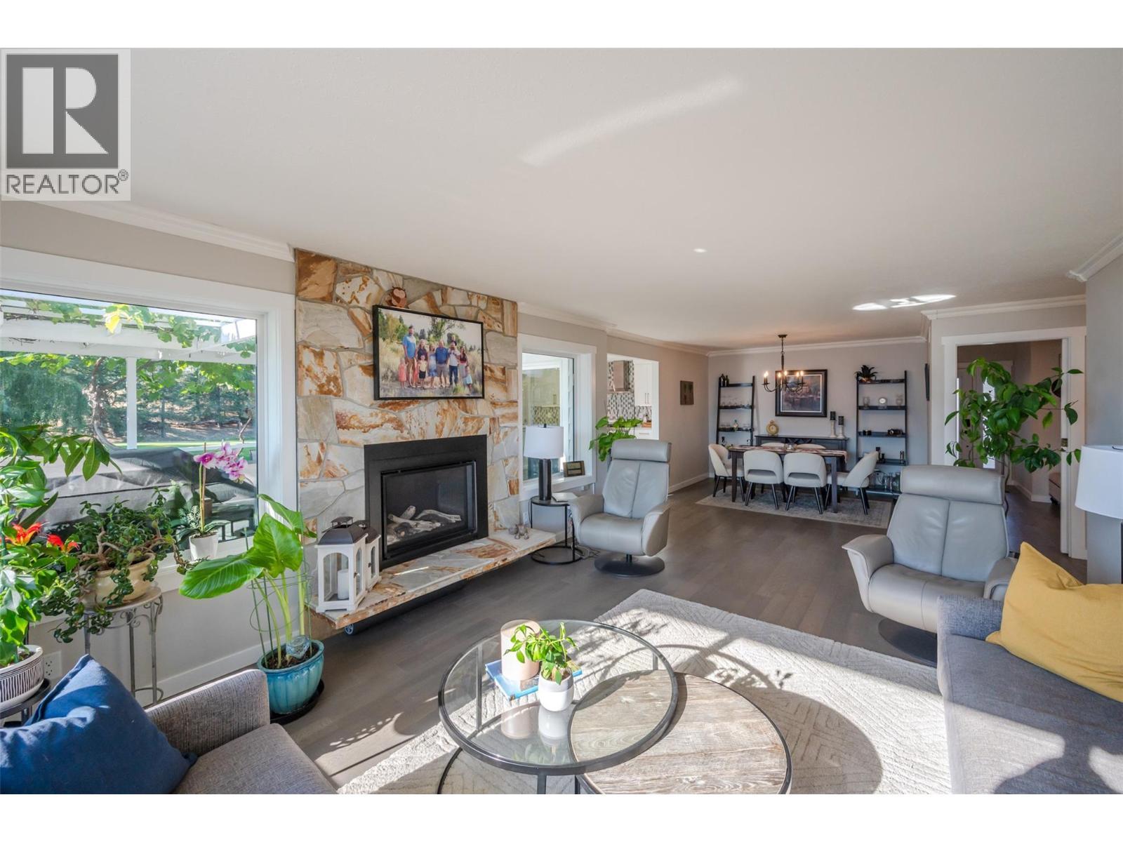 150 Sumac Ridge Drive, Summerland, BC - Indoor Photo Showing Living Room With Fireplace