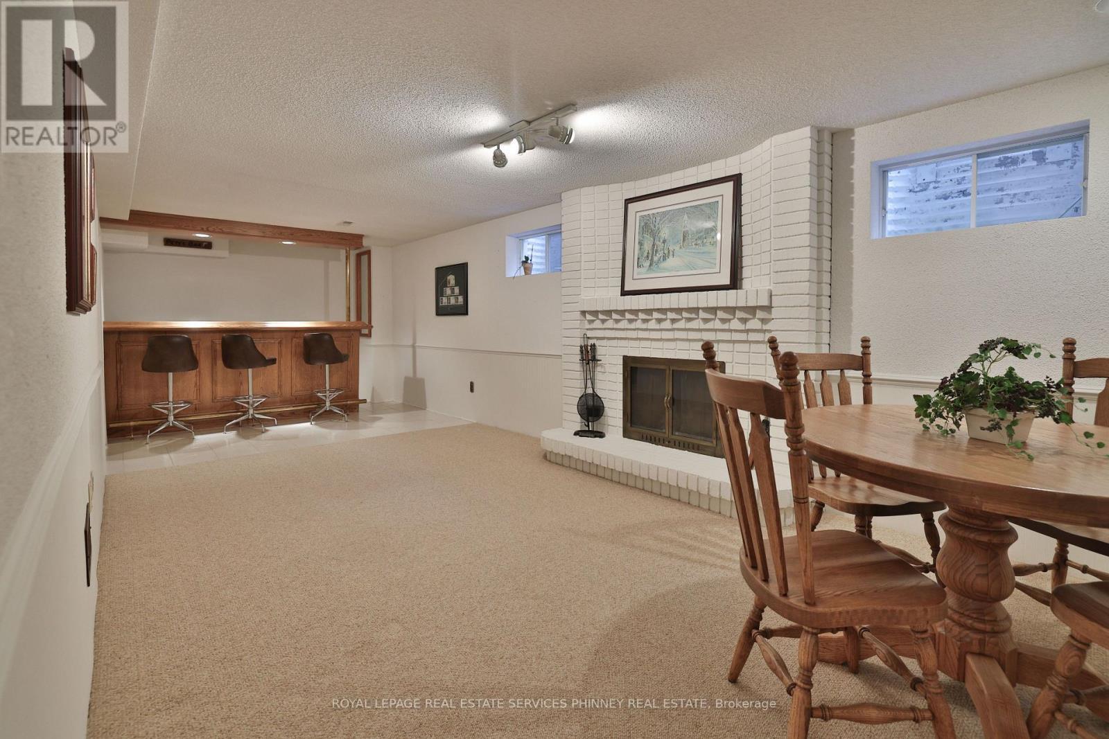 2289 Beejay Court, Mississauga, ON - Indoor Photo Showing Dining Room With Fireplace