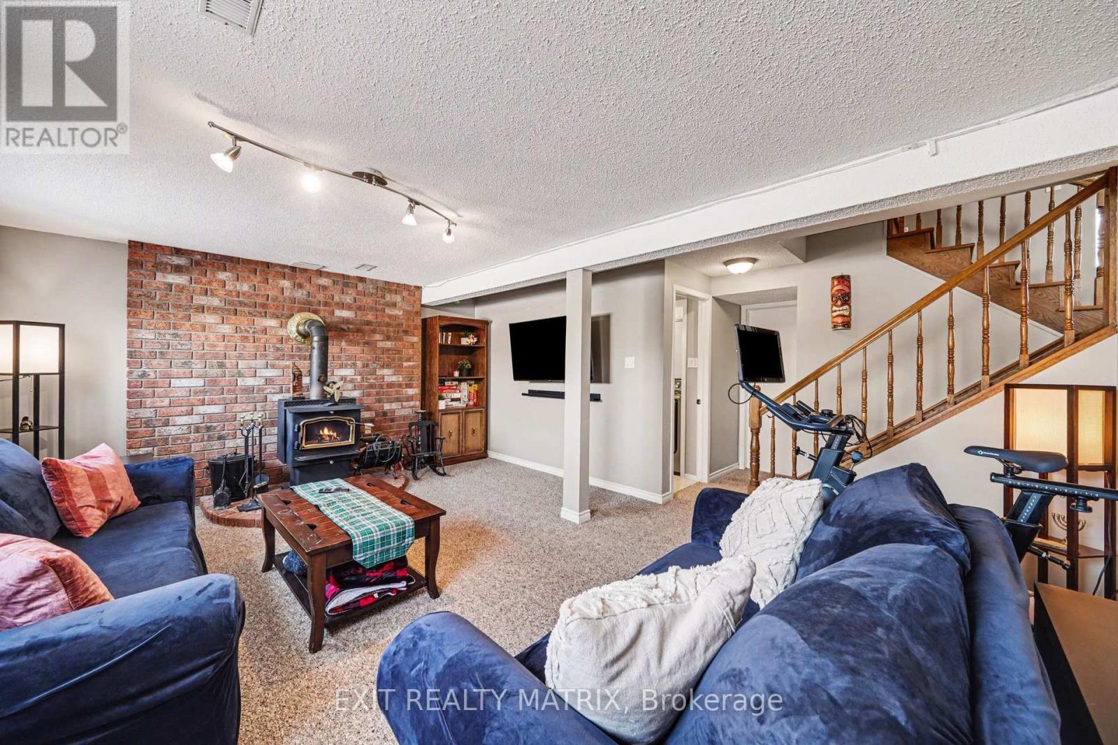 39 Lapointe Boulevard, Russell, ON - Indoor Photo Showing Living Room With Fireplace