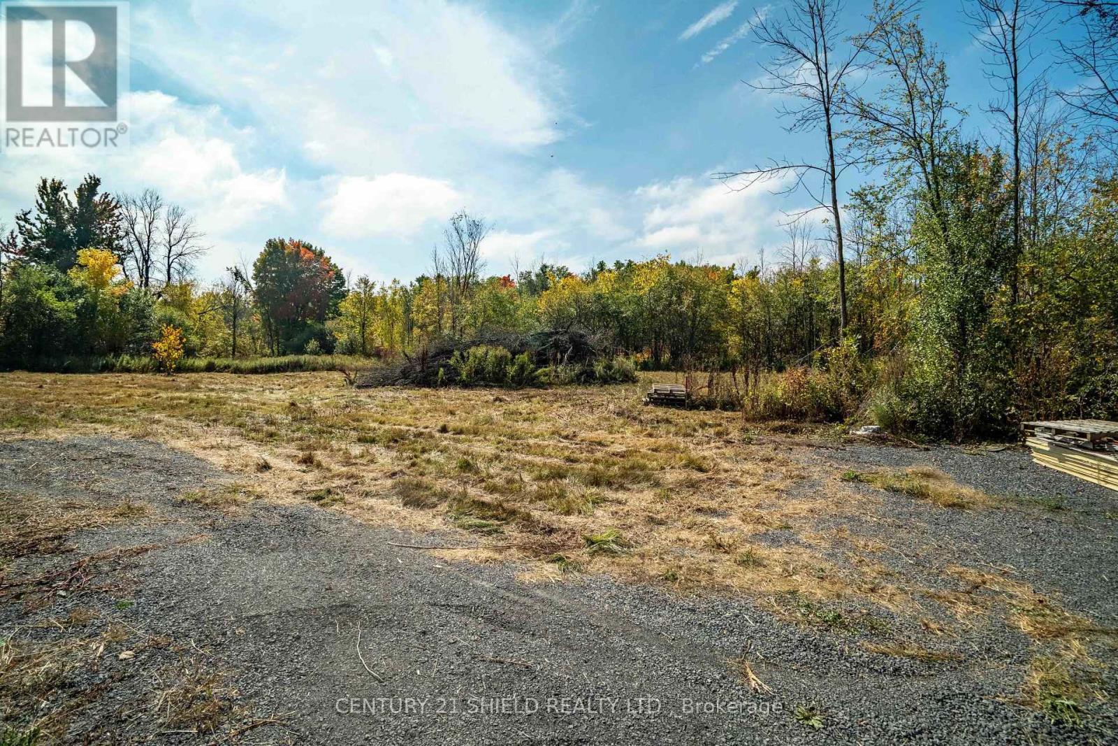 gravel laneway & mostly cleared lot - 15618 Dixon Road, South Stormont, ON