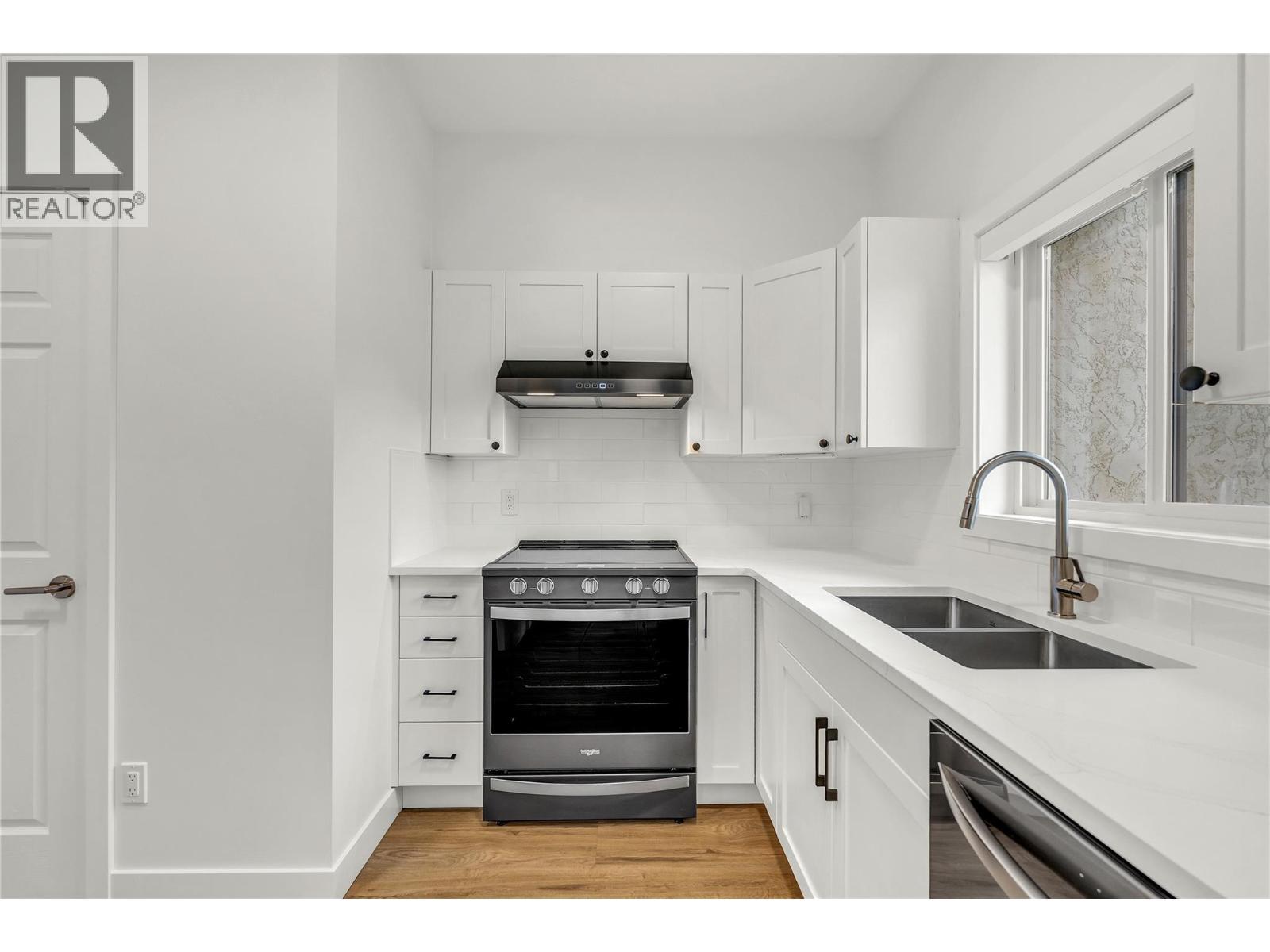 48 Galt Avenue Unit# 105, Penticton, BC - Indoor Photo Showing Kitchen With Double Sink