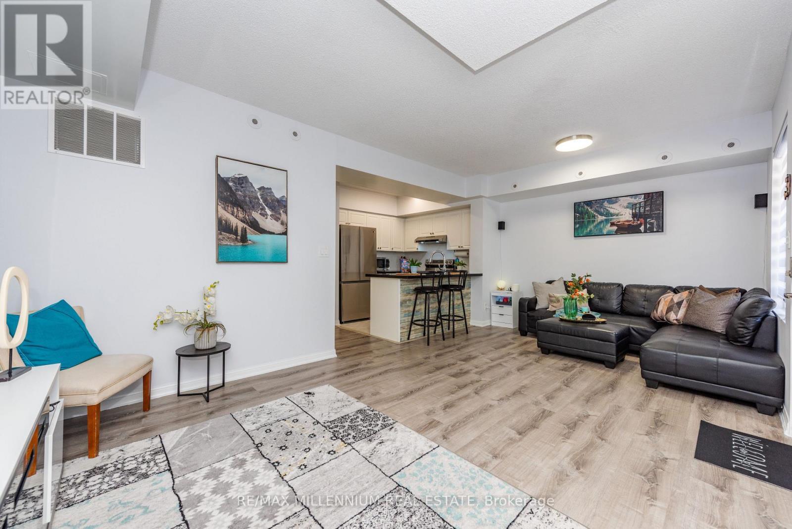 1034 - 3045 Finch Avenue E, Toronto, ON - Indoor Photo Showing Living Room