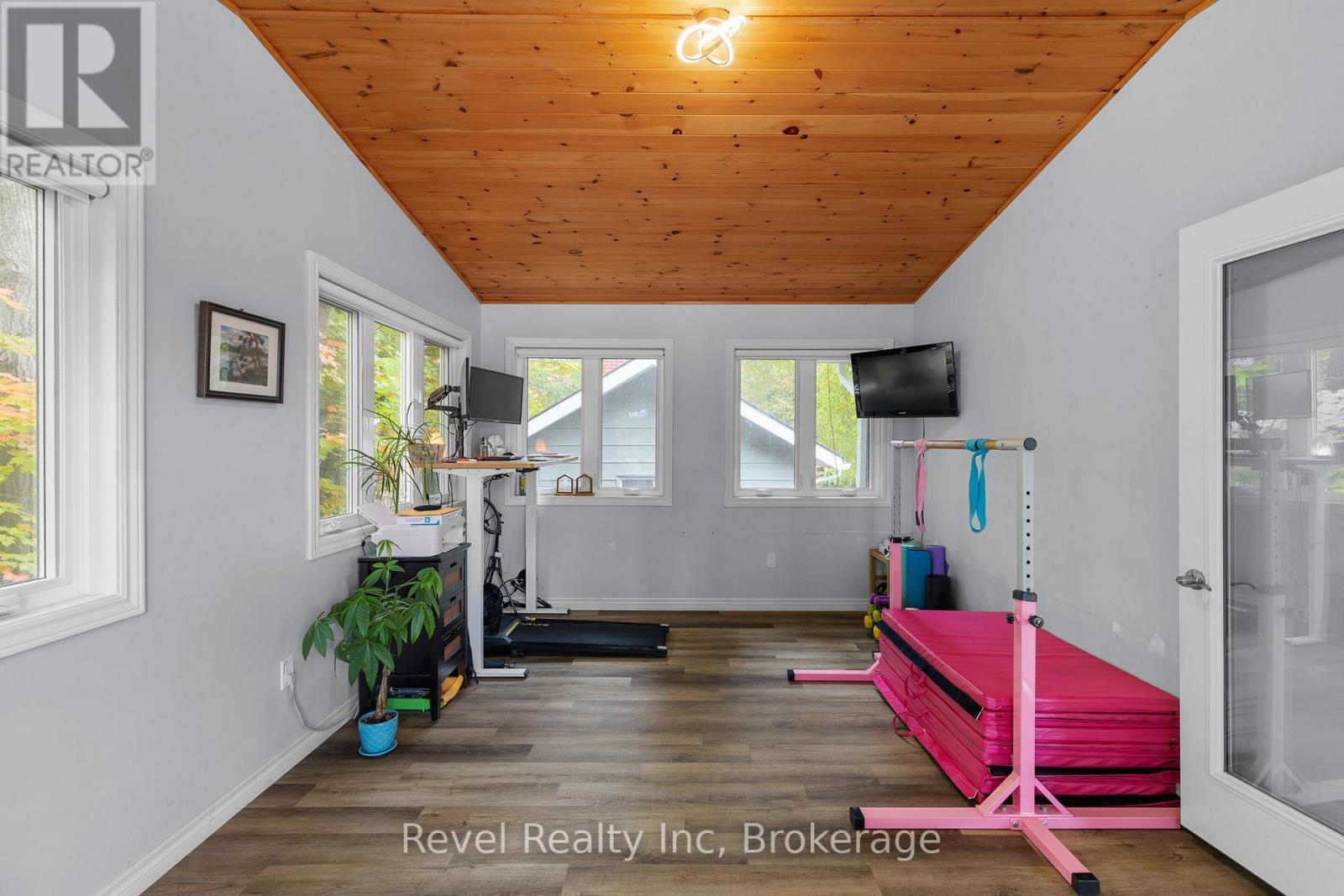 Main Floor Muskoka Room - 210 Burnett'S Road, Mckellar, ON - Indoor Photo Showing Gym Room