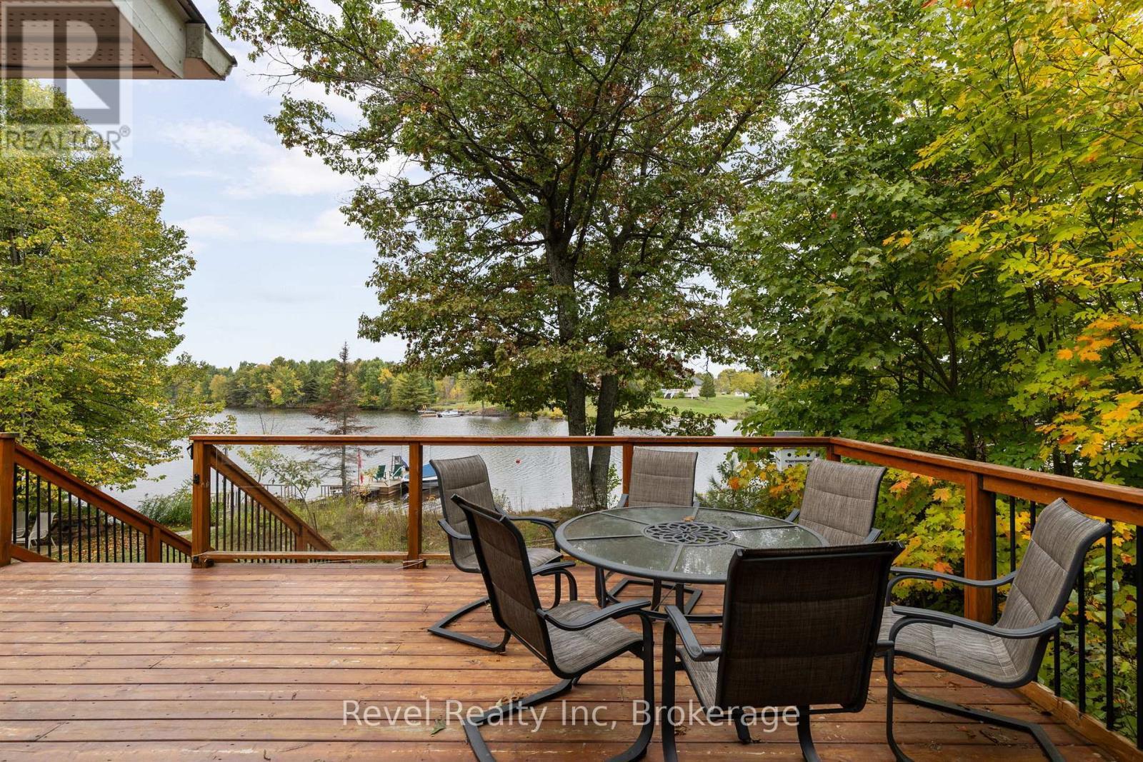 Main Floor Deck over looking lake - 210 Burnett'S Road, Mckellar, ON - Outdoor With Deck Patio Veranda With Exterior
