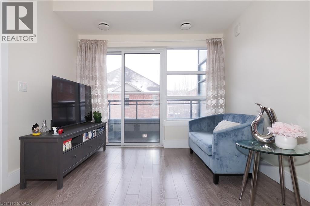 155 St. Leger Unit# 206, Kitchener, ON - Indoor Photo Showing Living Room