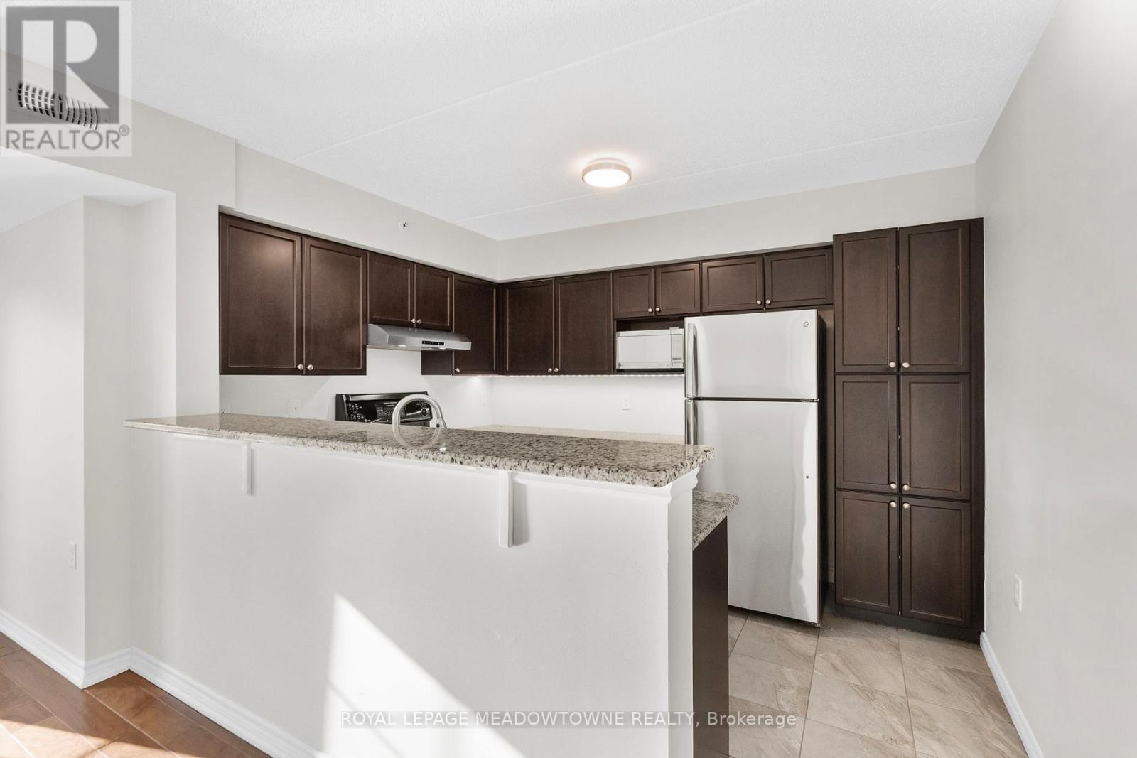 310 - 1470 Main Street E, Milton, ON - Indoor Photo Showing Kitchen
