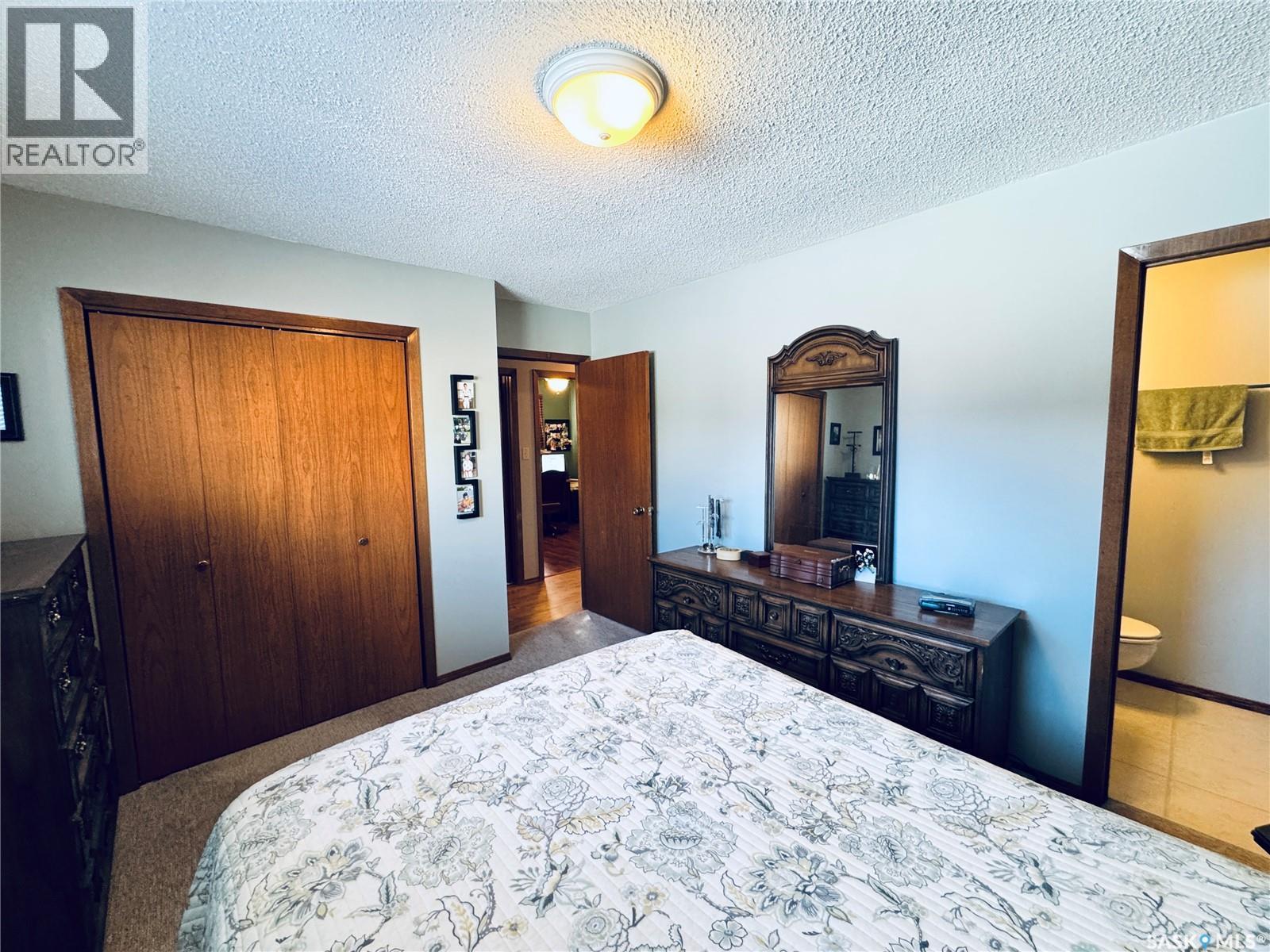 403 8Th Avenue W, Biggar, SK - Indoor Photo Showing Bedroom