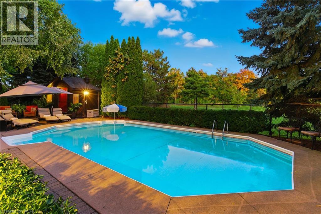 4184 Arbourfield Drive, Burlington, ON - Outdoor With In Ground Pool With Backyard