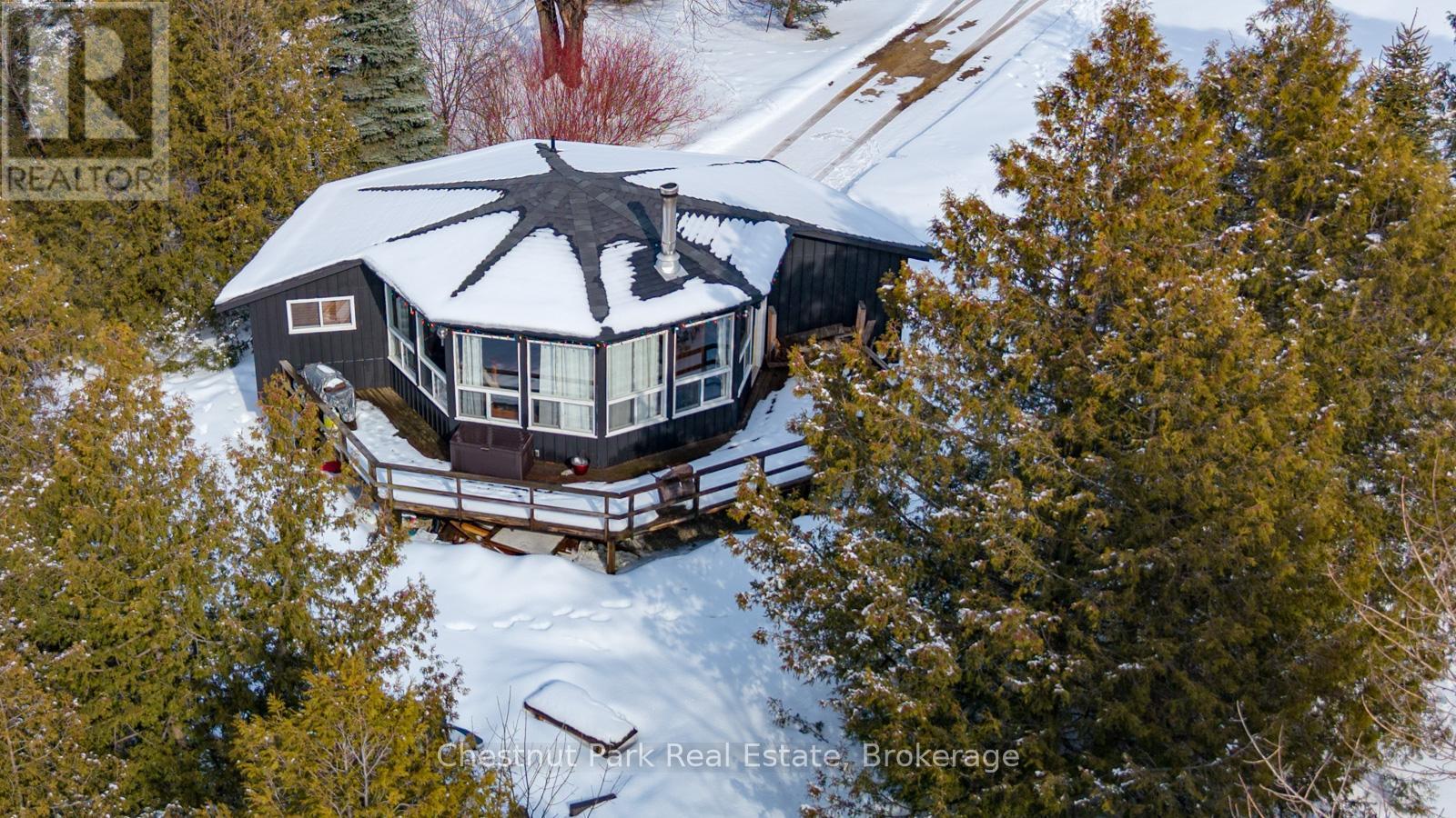 View of expansive back deck looking at ski hills - 158 Wensley Drive, Blue Mountains, ON - Outdoor With Deck Patio Veranda