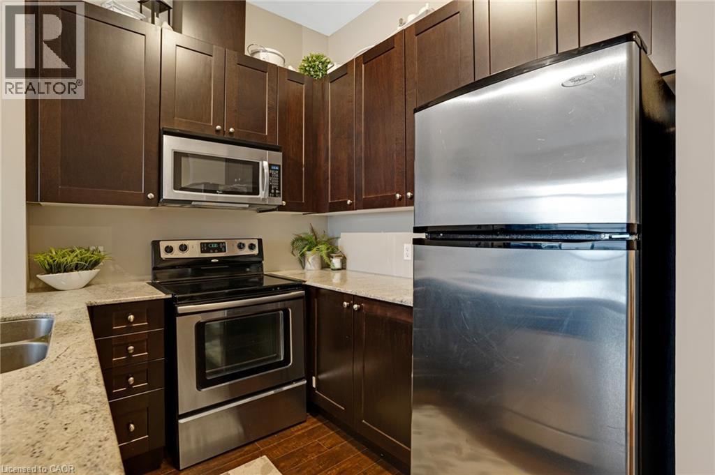 170 Water Street N Unit# 1206, Cambridge, ON - Indoor Photo Showing Kitchen With Stainless Steel Kitchen With Double Sink With Upgraded Kitchen